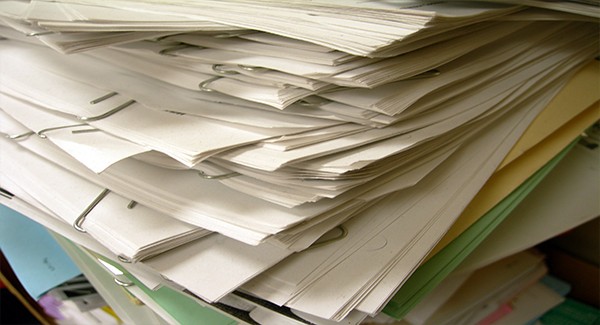 Picture of a pile of papers.
