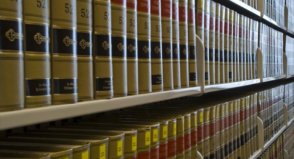 Picture of law books on a shelf.