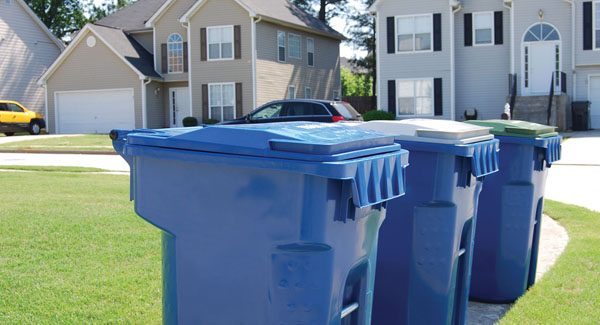 Picture of trash cans in condo and HOA street.