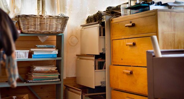 Picture of messy filing cabinets.