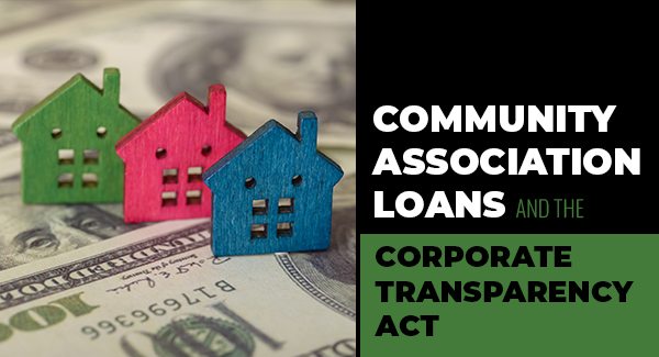 Picture of wooden homes on money representing HOA finances