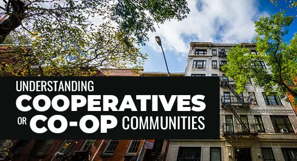 Street view of residential buildings with trees and a sign in the foreground that reads "Understanding Cooperatives or Co-op Communities.