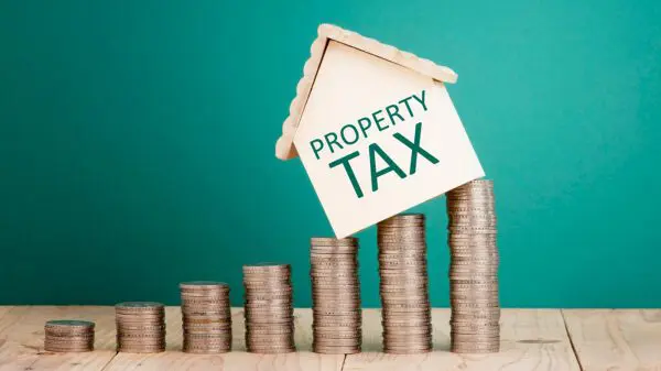 House on money representing high property taxes.