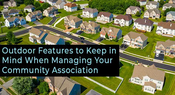 Aerial view of a suburban neighborhood with single-family homes, green lawns, trees, and streets; text overlay discusses managing community associations.