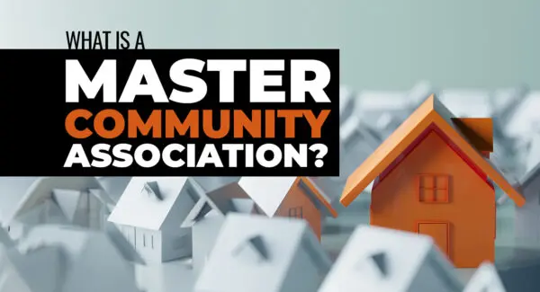 A group of white paper houses with one orange house in focus; text overlay reads, "What is a Master Community Association?.