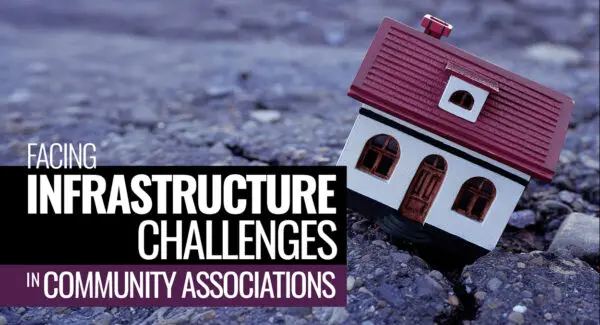 Model house tilted on cracked pavement with the text, "Facing infrastructure challenges in community associations.