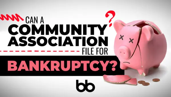 A broken pink piggy bank with coins and text asking if a community association can file for bankruptcy.