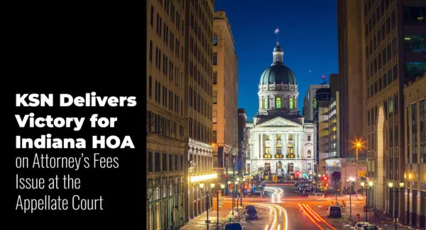 Night view of Indiana State Capitol building with surrounding city lights and traffic; text promotes legal victory for Indiana HOA regarding attorney’s fees at the appellate court.