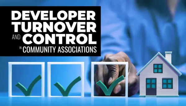 A person checks boxes next to a model house, with the text "Developer Turnover and Control in Community Associations" displayed on the left side.