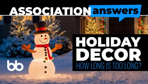 Inflatable snowman holiday decoration stands in a snowy yard at night, with Christmas lights on trees and a house in the background. Text reads: "Holiday Decor: How Long Is Too Long?.