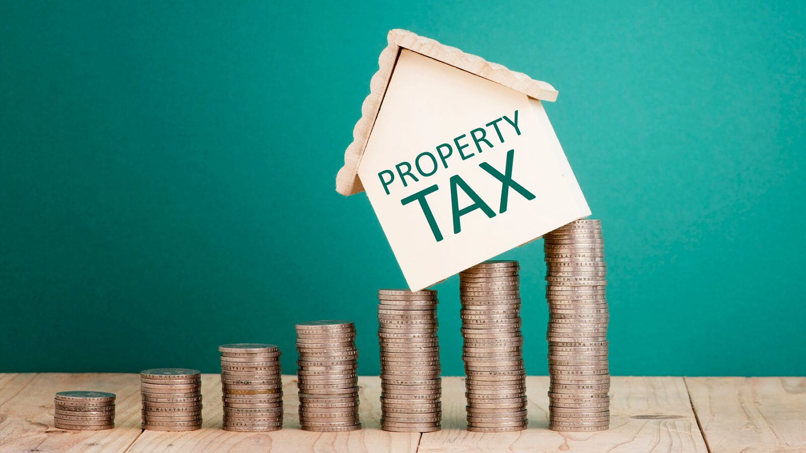 House on money representing high property taxes.